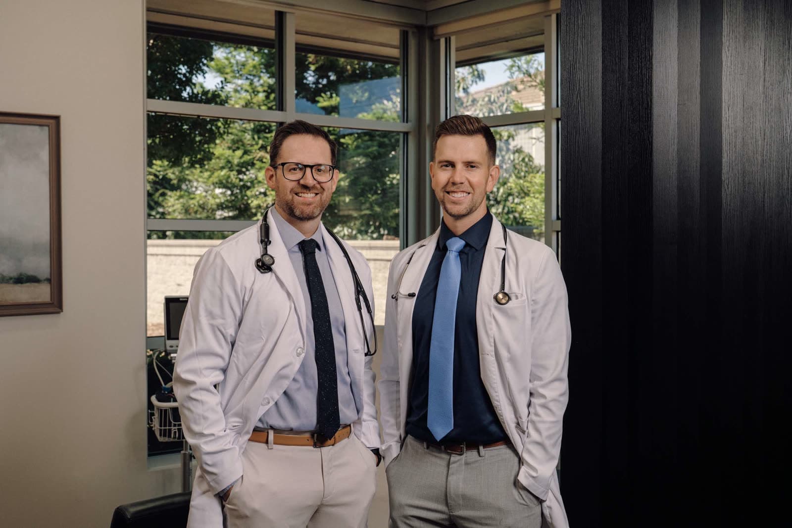 The two founding doctors of Smith Family Medicine in their new office